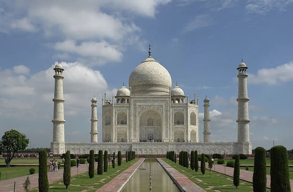 The Taj Mahal, Agra: Shah Jahan's tomb, 1632 to 1653, in Makrana marble with a bulbous double dome and four detached minarets.