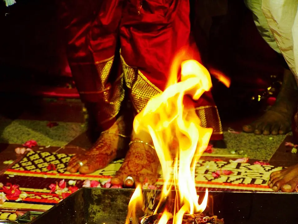 Saptapadi ritual before the sacred fire at a Hindu wedding