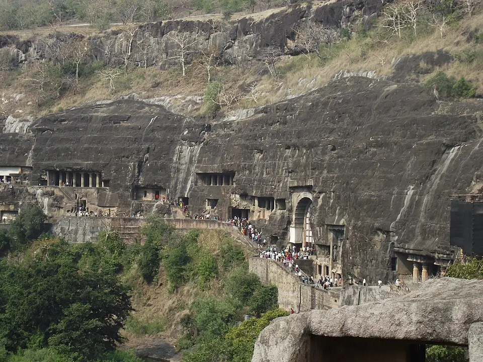 General view of the Ajanta caves cut along the curve of the Waghora gorge