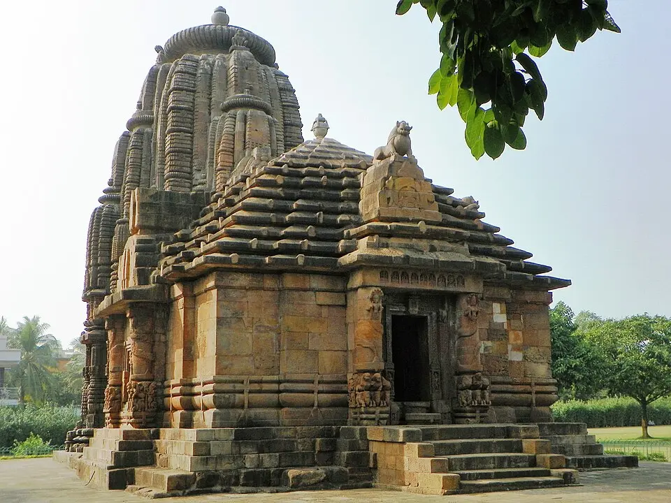 The Rajarani temple, Bhubaneswar: Famous for its directional guardians (ashtadikpalas) and the turrets clustering around the main shikhara.