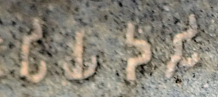Close up of the word Piyadasi in Brahmi script