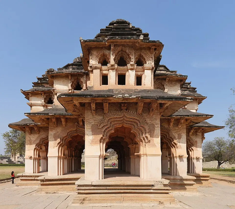 The Lotus Mahal: Cusped arches and plastered superstructure on a Hindu plan, in the zenana enclosure.