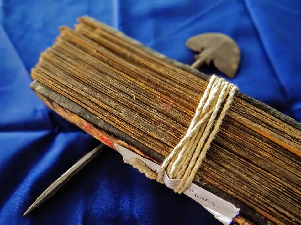 An Odia palm leaf manuscript with an iron stylus