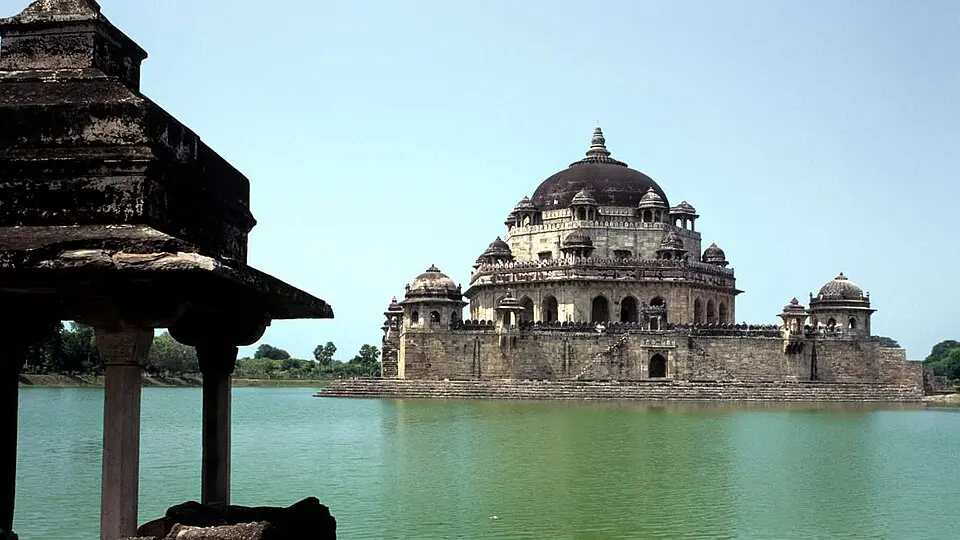 Sher Shah's tomb, Sasaram: The octagonal tomb on a plinth in a tank, about 46 m high in red sandstone, which Percy Brown calls the culmination of the Indo Afghan style.