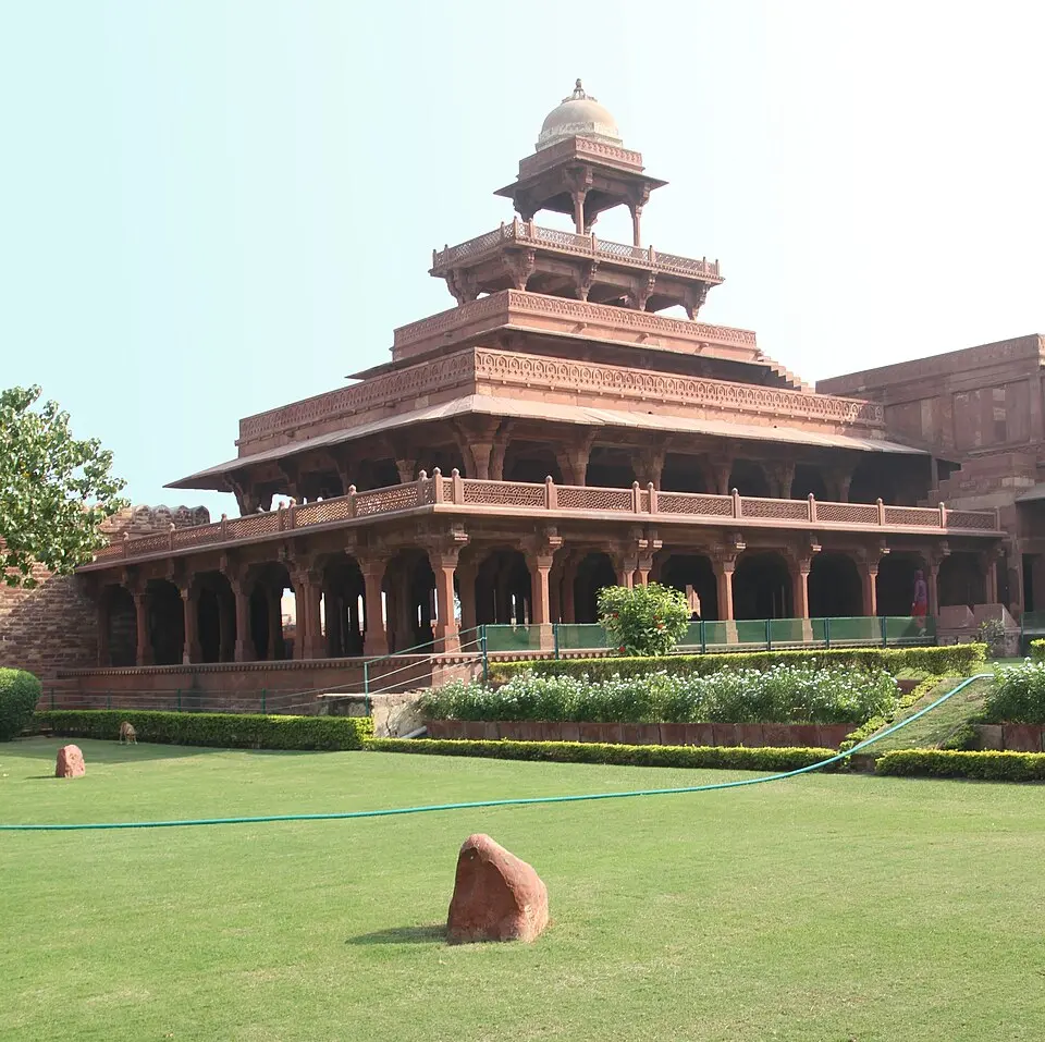 Fatehpur Sikri: A tiered pavilion of Akbar's city, built from 1571 in red sandstone in the trabeate manner of post and beam.