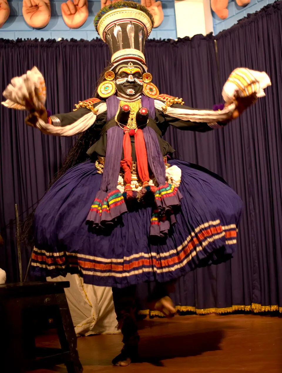 Kathakali dancer in full make up and costume